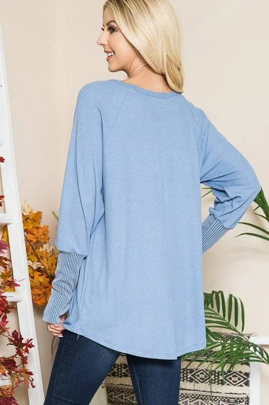 Long sleeved thumbhole knit tunic top